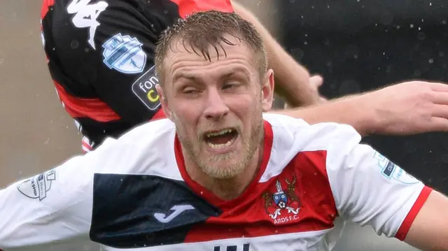 Ards defender Johnny Taylor