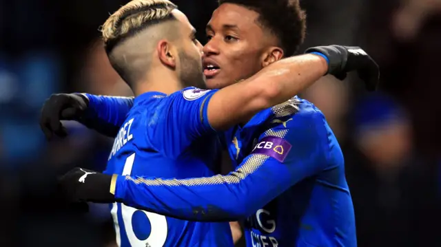 Riyad Mahrez embraces Demarai Gray