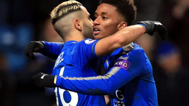 Riyad Mahrez embraces Demarai Gray