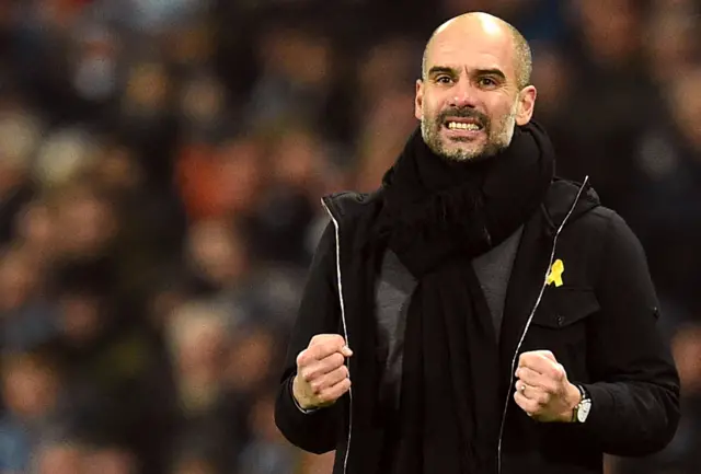 Pep Guardiola celebrates