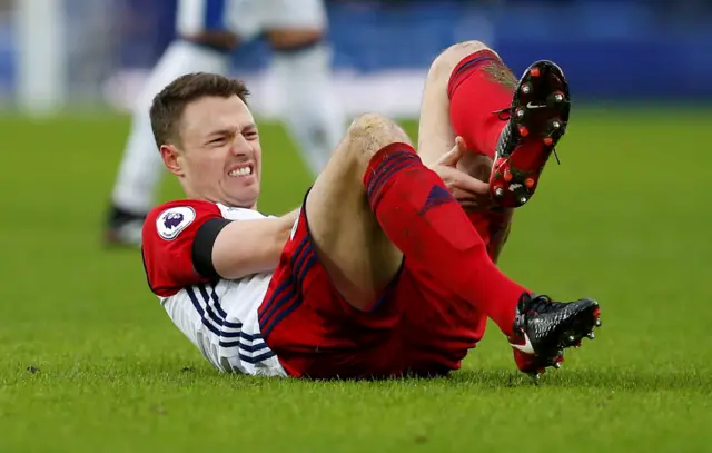 Jonny Evans appears injured
