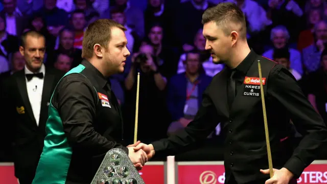 Mark Allen and Kyren Wilson shake hands before Masters final