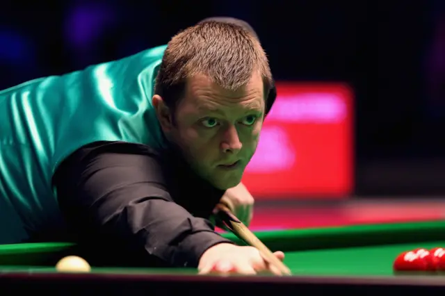 Mark Allen plays a shot