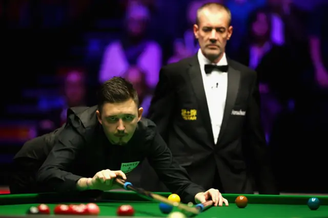 Kyren Wilson plays a shot