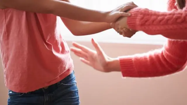 Parent and child fighting