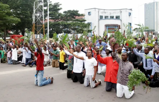 Demonstrators kneel and chant slogans during a protest organised by Catholic activists in Kinshasa, Democratic Republic of Congo January 21, 2018