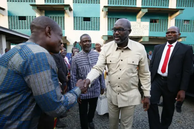 George Weah greets dignitaries during an exhibition of Liberian made products at the Liberia Market place, Nancy B. Doe Market in Monrovia, as part of events marking his official inauguration ceremony in Monrovia, Liberia, 19 January 2018.