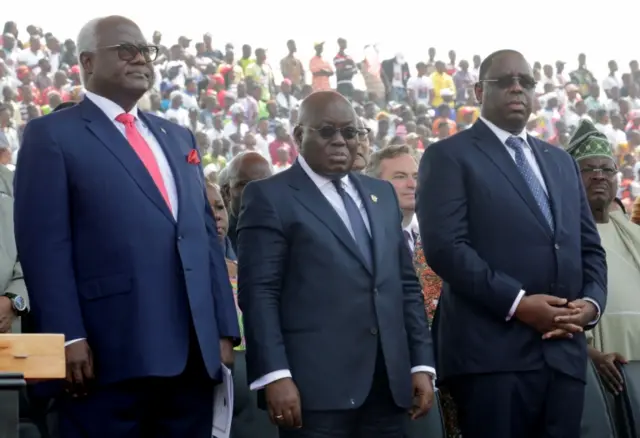 President of Sierra Leone Ernest Bai Koroma (L) President of Ghana Nana Akufo-Addo (C) and Senegal"s President Macky Sall are seen during new President elect George Weah"s swearing-in ceremony at Samuel Kanyon Doe Sports Complex in Monrovia, Liberia,