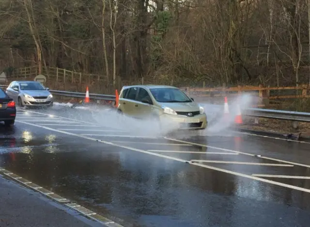 Cars driven through water