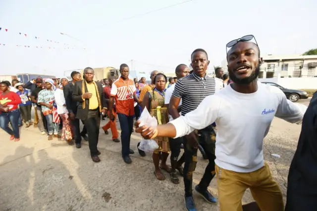 Liberians stand in line to enter the inauguration off the President-elect, George Weah, at the Samuel Kanyon Doe stadium, in Monrovia, Liberia, 22 January 2018.