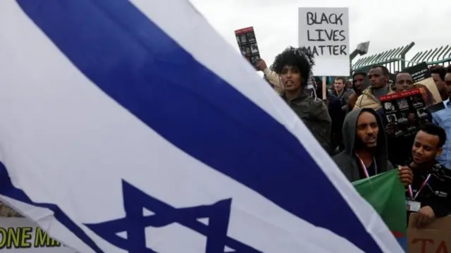 Africans immigrants in Israel take part in a protest