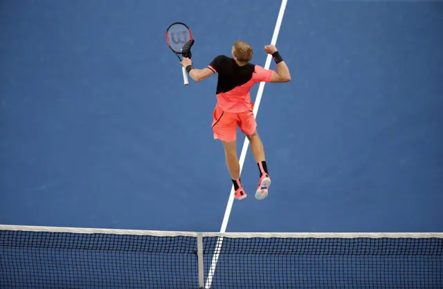 Kyle Edmund celebrates beating Andreas Seppi