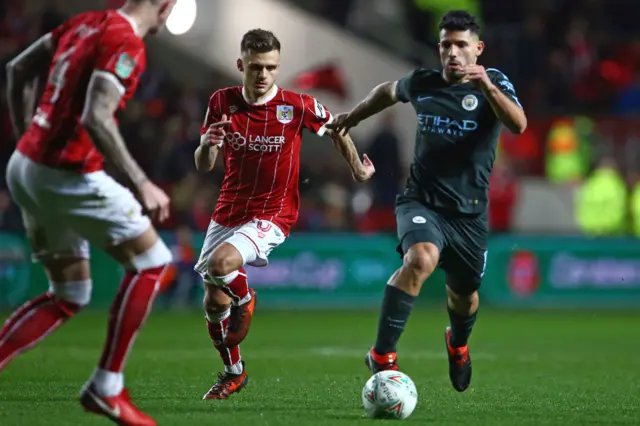 Sergio Aguero runs with the ball during Manchester City's 3-2 win over Bristol City in the EFC Cup semi-final second leg. City won the tie 5-3 overall