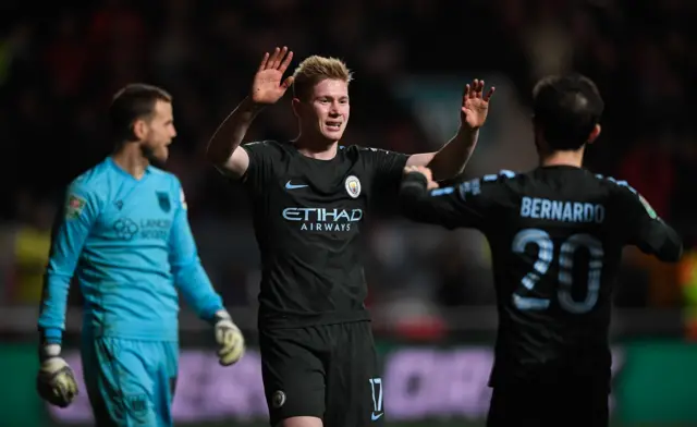 manchester city celebrate beating Bristol City