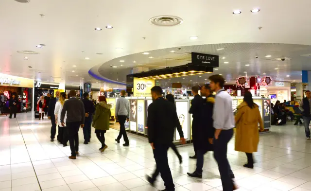 Passengers going through airport