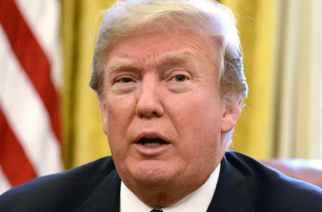 President Donald Trump makes remarks after he signs a Section 201 action in the Oval Office, at the White House, January 23, 2018, in Washington, DC.