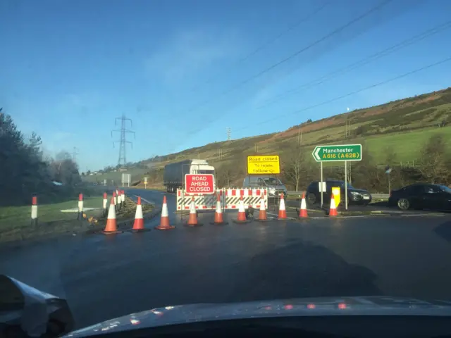 Road closure signs at roundabout