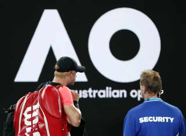 Kyle Edmund leaves the court