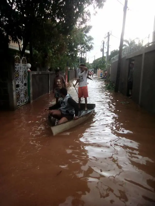 Residents use boats in the streets