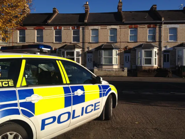 Devon & Cornwall police car outside a house in Exeter