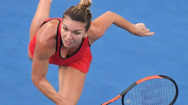 Simona Halep of Romania serves