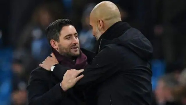 Lee Johnson (left) and Pep Guardiola