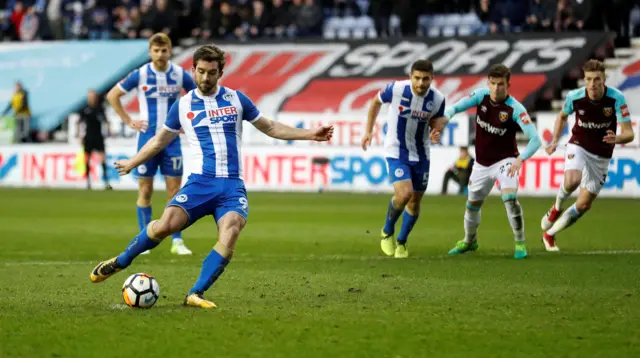 Will Grigg scores his second goal