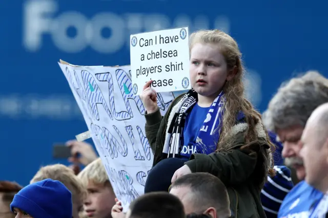 A Chelsea fan asks for a shirt