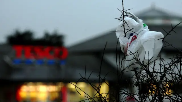 A plastic bag caught in bushes outside a supermarket near Wadebridge