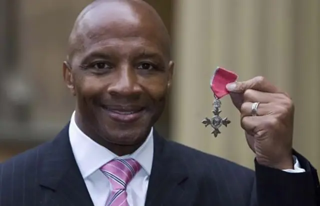 Cyrille Regis with MBE