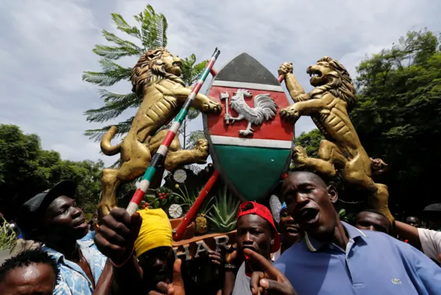 Supporters of Kenyan opposition leader Raila Odinga of the National Super Alliance (NASA) coalition gesture ahead of his planned swearing-in ceremony as the president of the People's Assembly in Nairobi, Kenya January 30, 2018