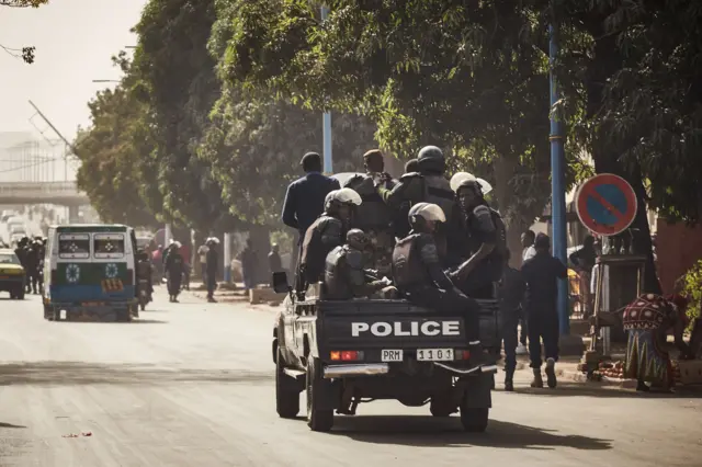 Malian police forces deploy to block a group of demonstrators (not in picture) marching towards the French Embassy in Bamako, to protest against the continued presence of the French Forces in Mali, on January 10, 2018.