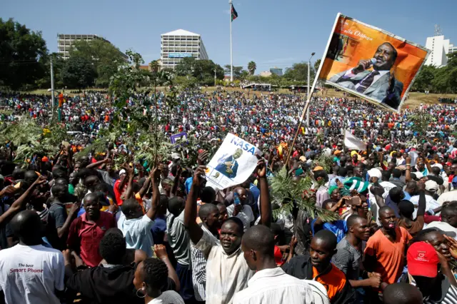 Supporters of Kenyan opposition leader Raila Odinga of the National Super Alliance (NASA) coalition gather ahead of Odinga"s planned swearing-in ceremony as the President of the People"s Assembly at Uhuru Park in Nairobi, Kenya January 30, 2018.