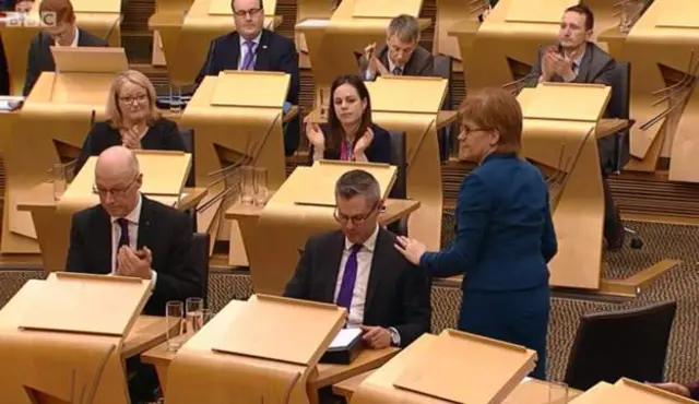 Pat on the shoulder for Derek Mackay from the first minister