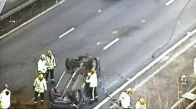 Overturned car on motorway