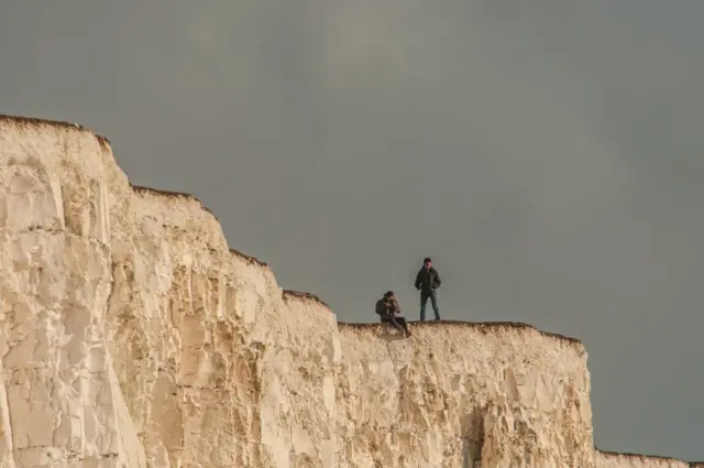 People close to the edge of Birling Gap