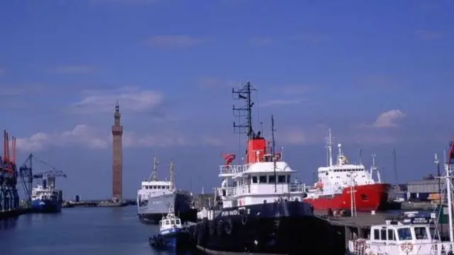 Grimsby dock tower and boats in the dock.