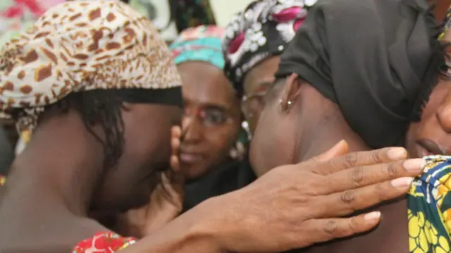 Chibok girls and families embrace