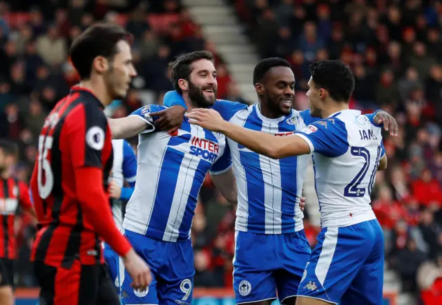 Will Grigg celebrates scoring for Wigan against Bournemouth