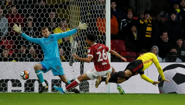 Troy Deeney scores