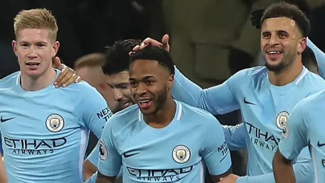 Raheem Sterling (centre)