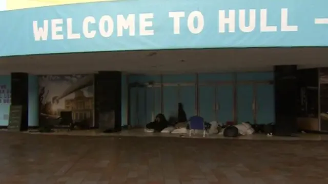 Rough sleepers under the canopy of the old BHS building in Hull.