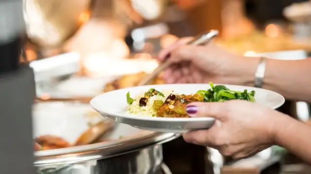 A woman serving food