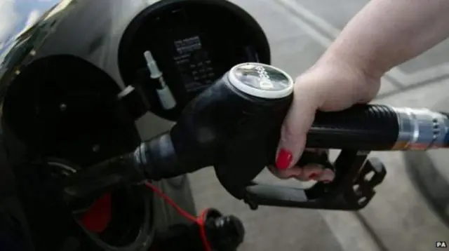 Car being filled with fuel