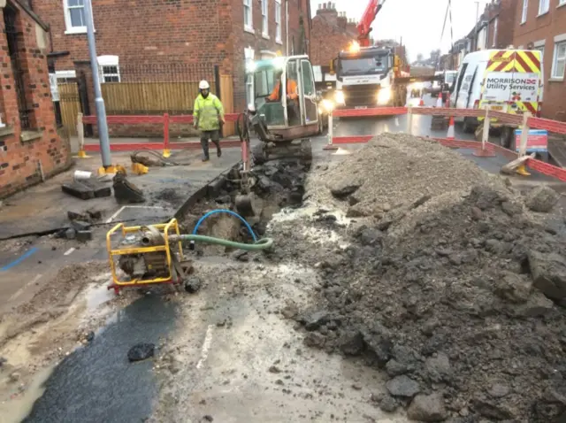 Road being dug up.