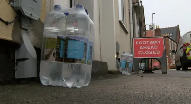 Bottles of water outside a house in Beverley.