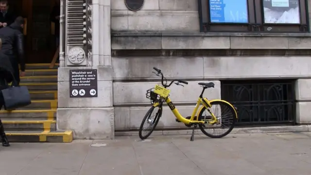 OFO bike outside Graves Library in the city centre