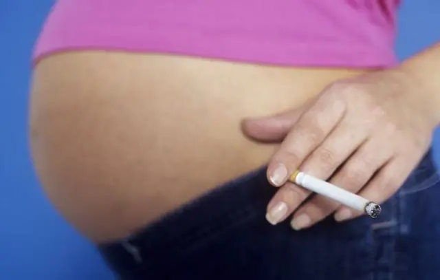 Pregnant woman smoking