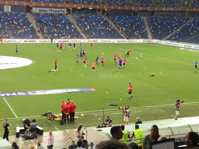 Scotland warm up in the Sammy Ofer Stadium pre-match