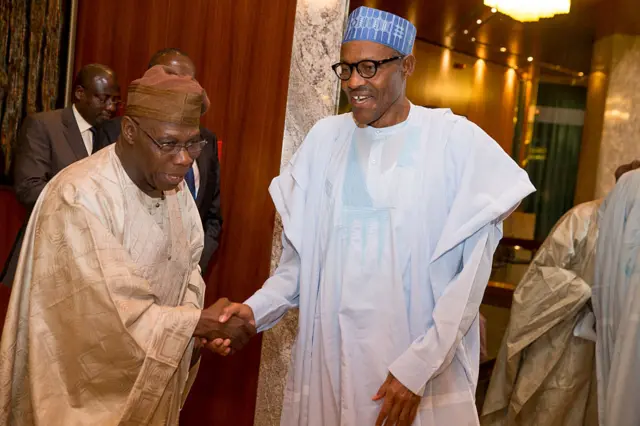 President Muhammadu Buhari receives former President Olusegun Obasanjo at the Presidential villa during a delegation from Columbia visits to the President in Abuja , 12 October 2015